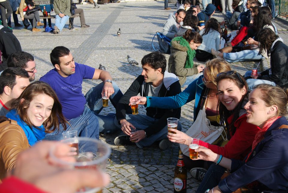 Free tour group enjoying beers in Lisbon